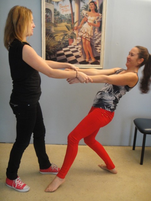 Natalia working through an exercise with one of the students
